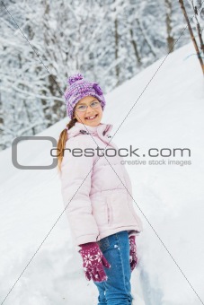 winter girl throwing snowball