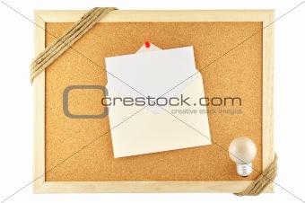 Envelope pinned on cork notice board
