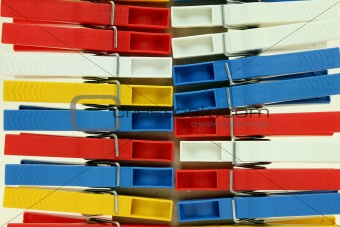 Several colored plastic clothespins