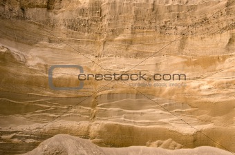 Geological layers of earth in deep sand pit 