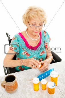 Disabled Woman Takes Medicine