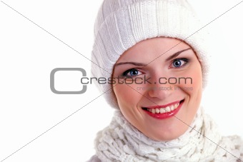 Beautiful cheerful girl in winter cap