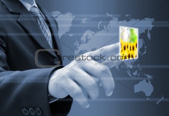 businessman hand pushing a button streaming images on a touch screen interface