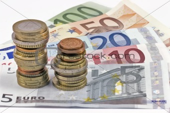 Close-up of Euro banknotes and coins