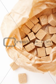 brown sugar cubes in sugar paper bag