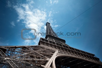 Eiffel Tower in Paris shot against a blue sky