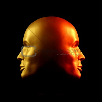 Two-faced head statue, red and gold
