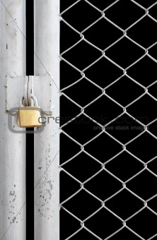 chain link fence and metal door with lock isolated on black