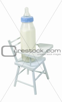 Baby Bottle in a High Chair