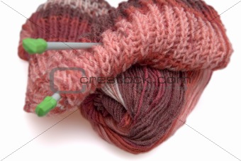 Incomplete a knitted scarf of claret color