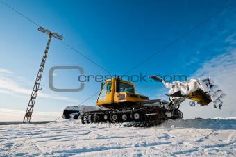 Snowcat on top of the mountain