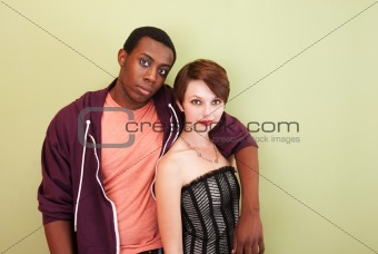 Mixed race couple stare at the camera