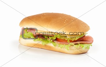 half of long baguette sandwich with lettuce, tomatoes, and ham