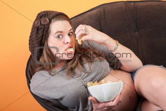 Pregnant Woman Eats Potato Wafers