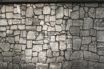 The wall is made from fragments of monuments