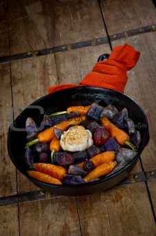 Prepared Root Vegetables in a Cast Iron Skillet