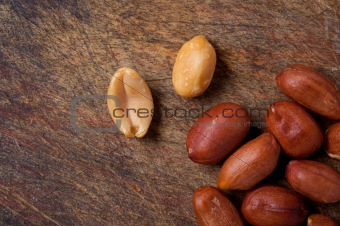Peanuts on a wooden table.