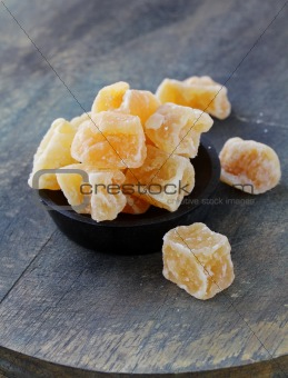 candied ginger on a dark background