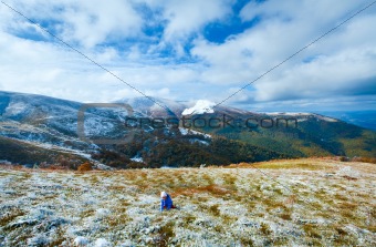 First winter snow on autumn  mountain plateau