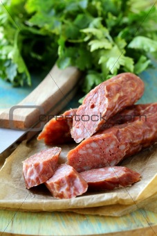 smoked sausage on a wooden board
