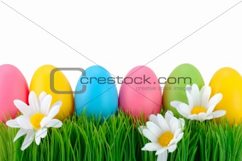 Easter colored eggs on the grass. 