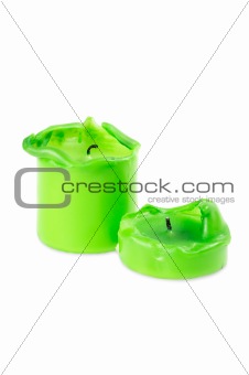 Two green big  melting  candle
