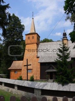 Wooden church among trees