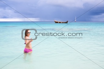 Young happy girl on the sea
