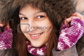 Smiling girl in hood