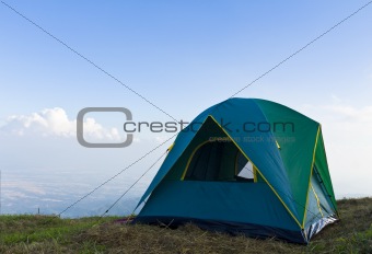 Tent on a grass and blue sky