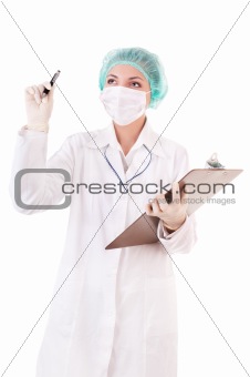 Careful doctor with pen looks up