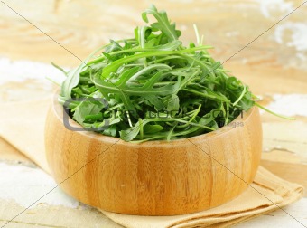 bowl of fresh green, natural arugula
