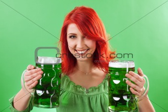 Redhead holding green beers