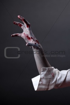 Creepy zombie hand, extreme body-art 