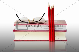 Glasses book pencil reflection for education concept