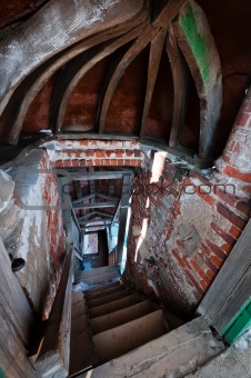 Stairs tunnel in abandoned church