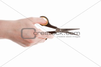 Female hand holding scissors 