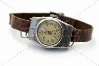 The old watch on white background