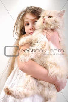 kid  with a Persian cat