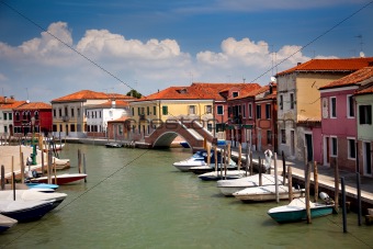Canal with colorful houses / Italy / nobody