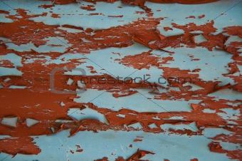 Old rustic red peeling paint