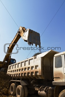 excavator loader and truck