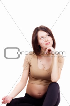 beautiful pregnant woman looking up