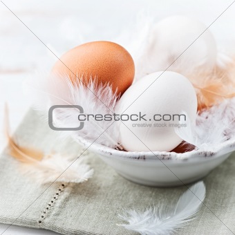 White and Brown Eggs in a Bowl. Easter Decor