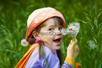 funny girl with dandelions