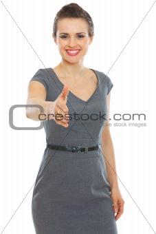 Business woman stretching hand for handshake