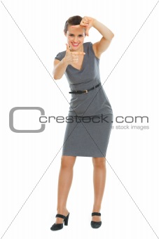 Business woman making frame with hands