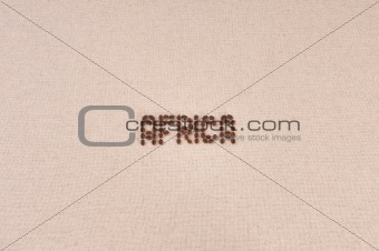 Canvas with coffee beans forming the word Africa