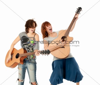 Two Beautiful Young Girls playing guitar 