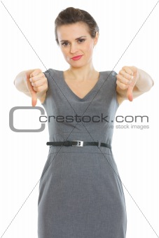 Woman showing thumbs down